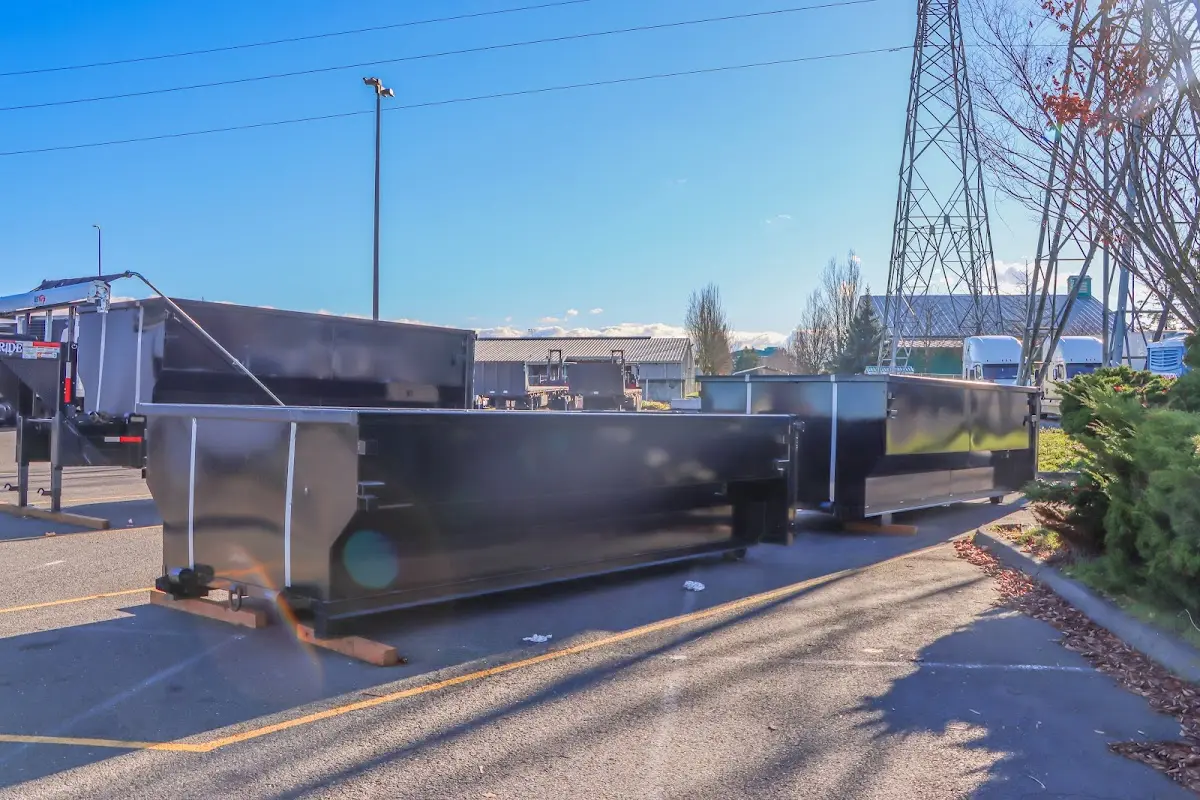 Roll-off dumpster ready for waste disposal at job site for Construction Dumpster Rental in Cedar Falls